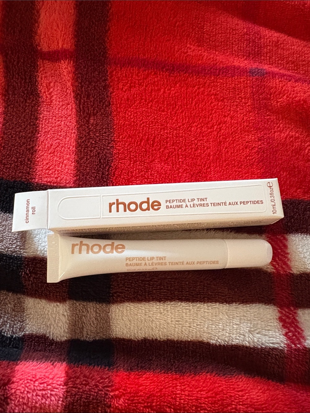 RHODE Peptide Lip Tint in Cinnamon Roll - Soft Red Tint